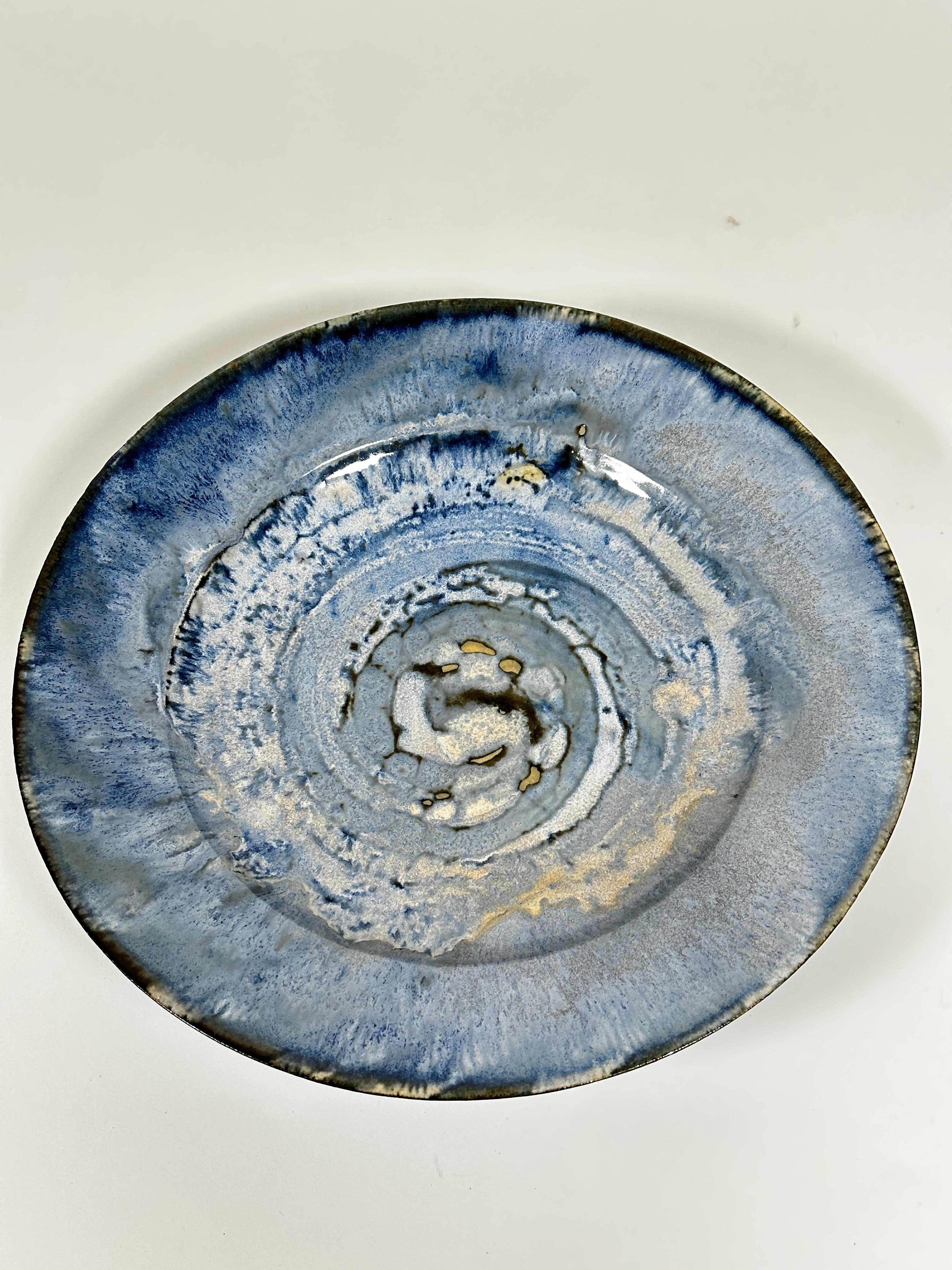 A pottery circular dish decorated with spiralling brown pale blue and turquoise blue glaze, with - Image 4 of 4