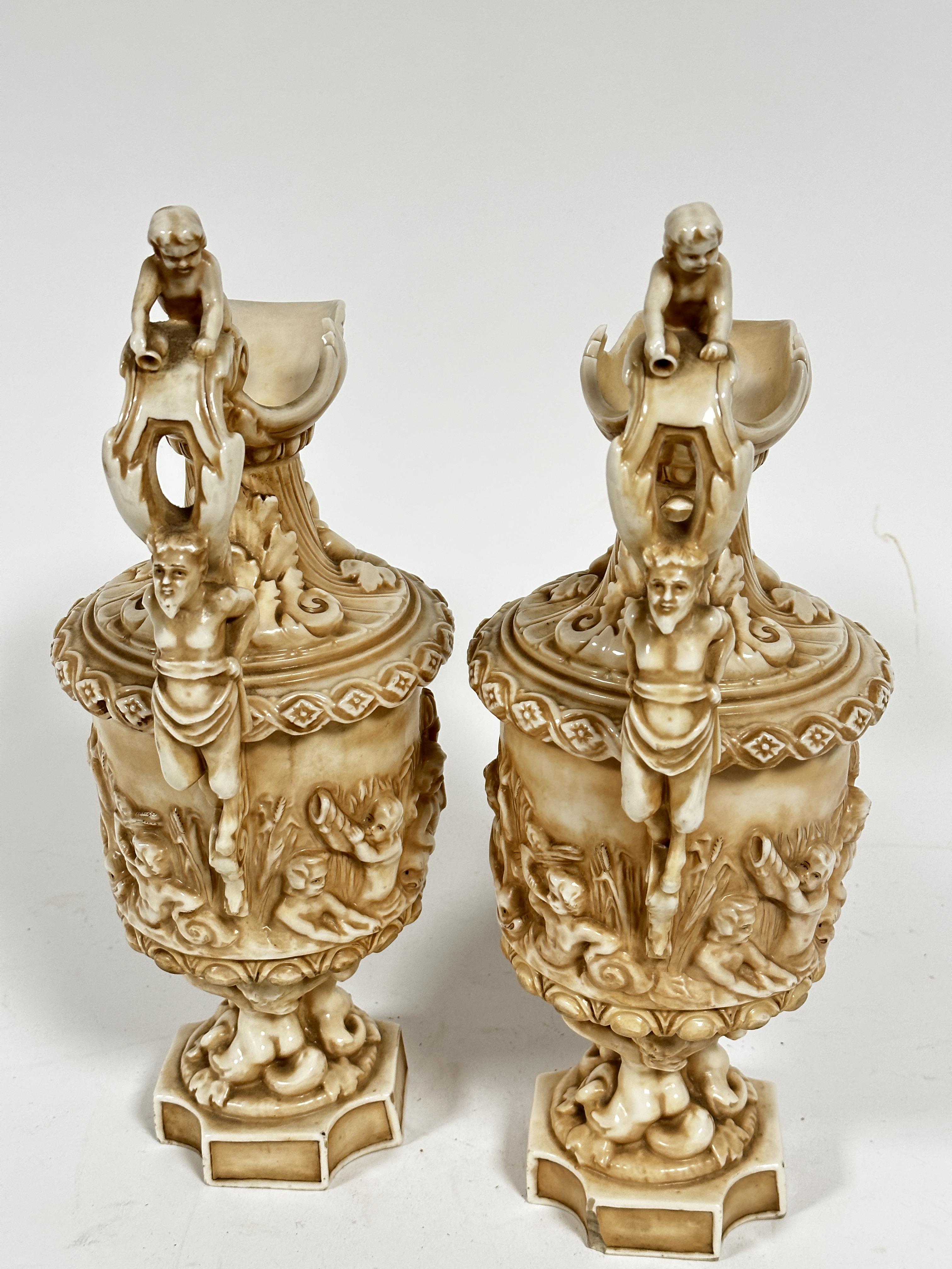 A pair of late 19thc Rudolstadt Straus & Sohne ewers, the handles mounted with cherubs with mask - Image 5 of 12