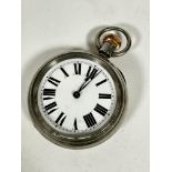 A stainless steel cased open faced pocket watch with enamelled dial and roman numerals