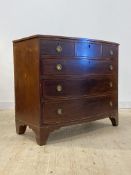 A Scottish Regency mahogany bow front chest, fitted with three short and three long graduated and