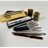 A Cross pen and pencil set with anodised metal and gilt finish, a collection of four various