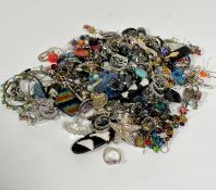 A large collection of white metal, silver and paste set earrings, bracelets, rings etc