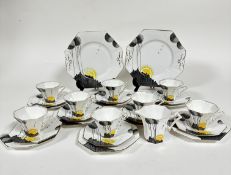 A Melba bone china Art Deco twenty eight piece tea service including two octagonal cake plates,