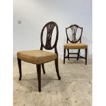 A Hepplewhite period mahogany dining chair, with gadrooned oval back and fluted splat, seat