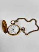 A gold plated full hunter engine turned cased pocket watch with yellow metal albert (d.5cm) with