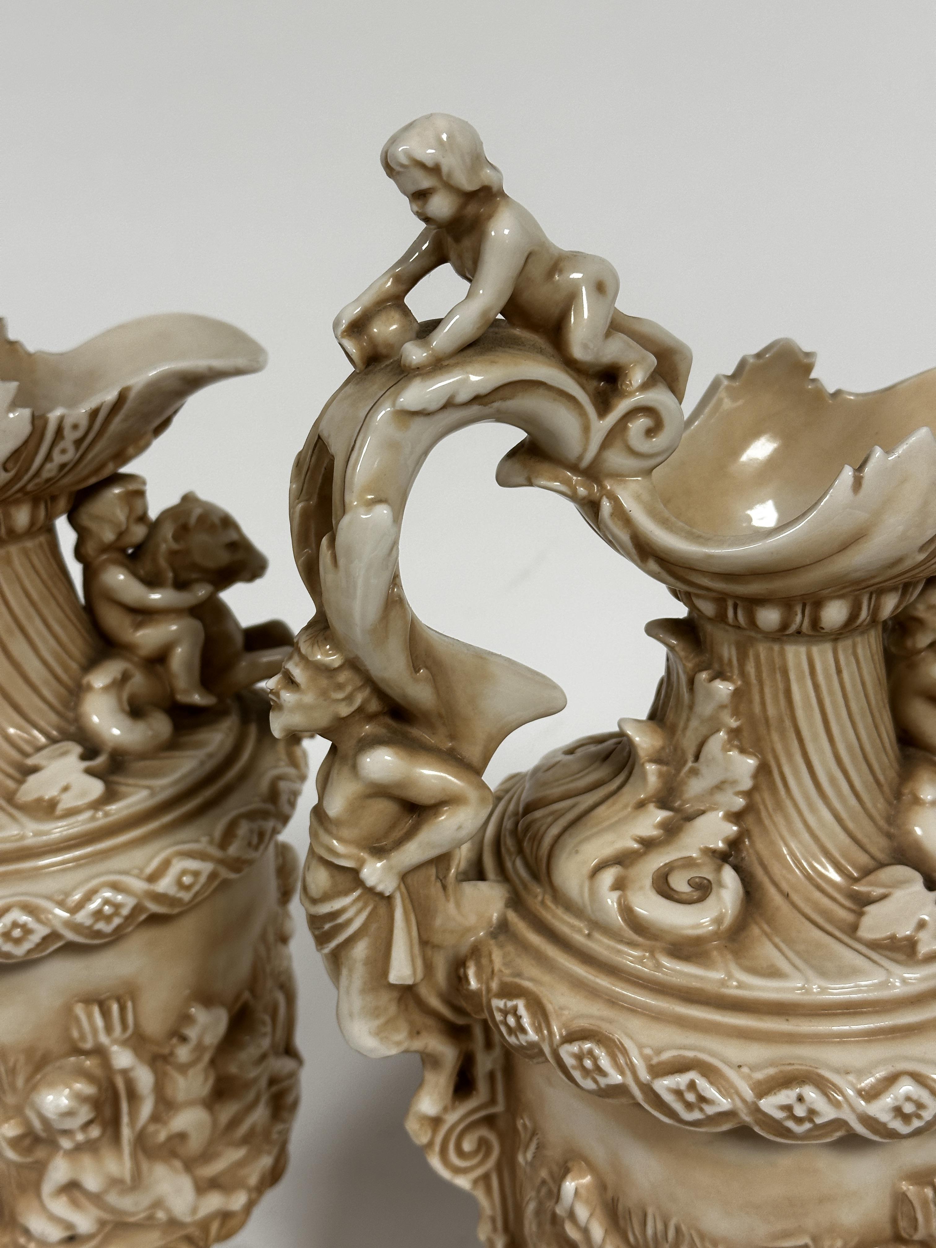 A pair of late 19thc Rudolstadt Straus & Sohne ewers, the handles mounted with cherubs with mask - Image 7 of 12