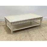 A Gustavian style cream painted coffee table, fluted frieze with carved rosette to each corner,