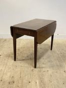 An early 19th century mahogany Pembroke table, with drawer to one end, raised on square tapered