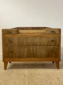 A mid century satin walnut dressing chest by Lebus, circa 1960's, with tambour cupboard to top