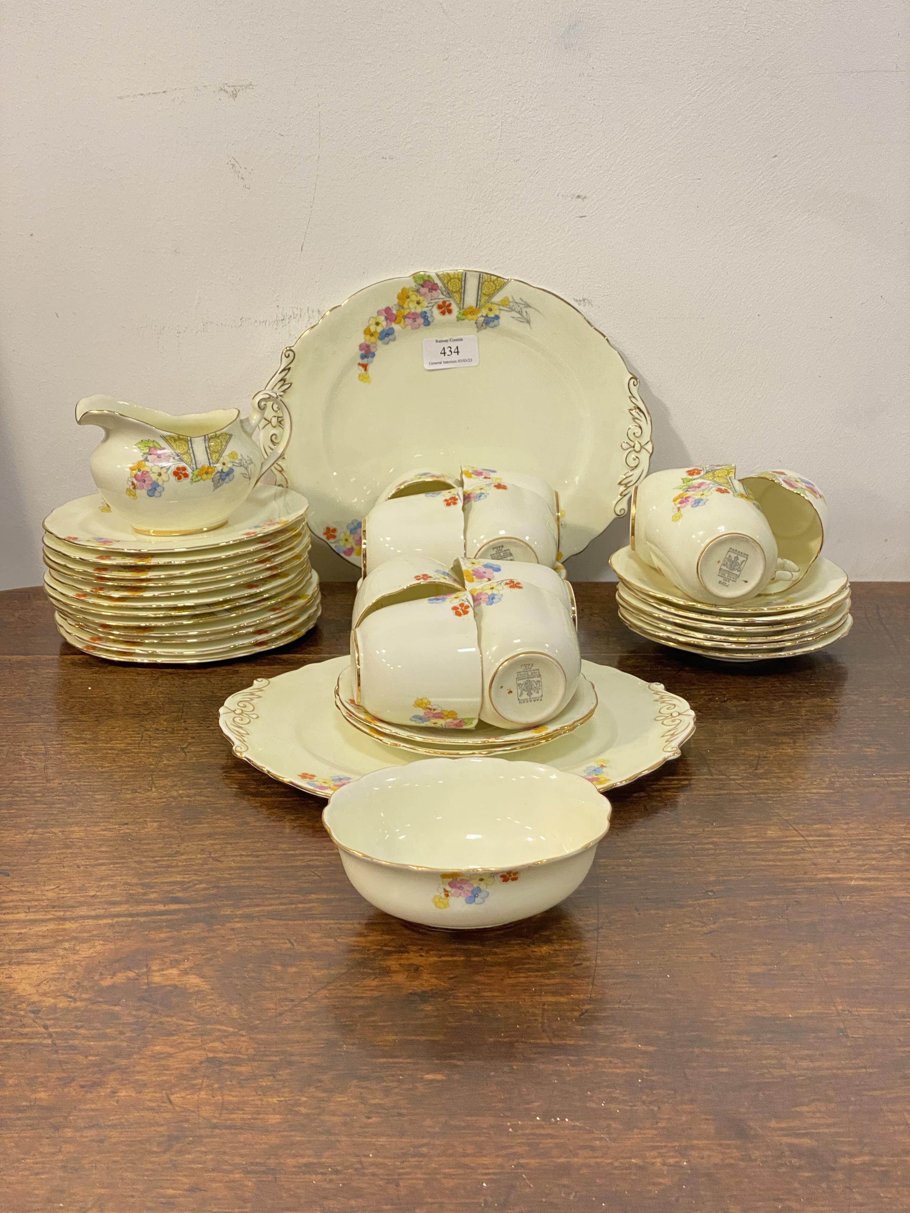 A Paragon china part tea service, comprising two serving plates, milk jug, sugar basin, eleven