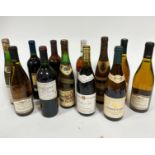 A group of four bottles of red and eight bottles of white wine, including Pouilly-Fume 2004,