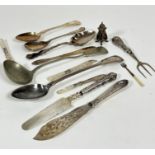 A collection of Epns including a pickle fork, a mother of pearl handled butter knives and butter