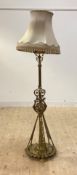 An ornate Edwardian cast brass standard lamp, converted from an oil lamp, H168cm