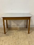 A mid century work console table, the formica top over square section oak supports, H77cm, W117cm,