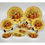 A collection of Aynsley china Orchard Gold pattern comprising two scalloped plates, (d 26.5cm) one
