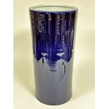 A Chinese modern cylinder stick stand with dark blue glaze, (59cm x 28cm)
