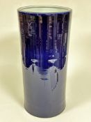 A Chinese modern cylinder stick stand with dark blue glaze, (59cm x 28cm)