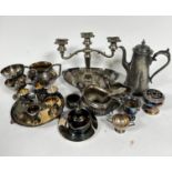 A collection of plated items including a three branch candelabra, (26cm x 27cm), a Britannia Metal