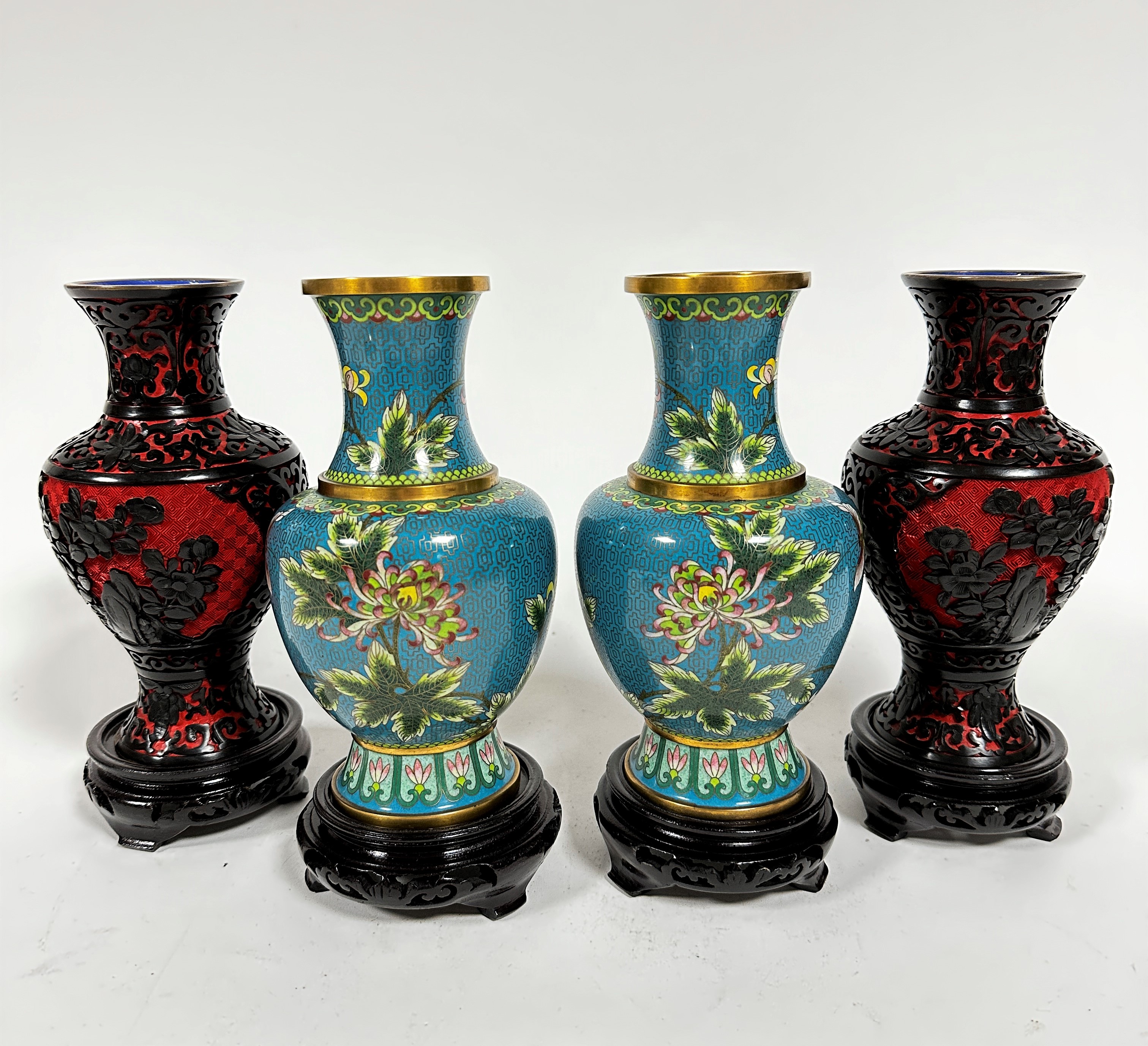 A pair of modern Chinese blue cloisonne enamelled baluster vases decorated with honeysuckle and