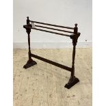 A late Victorian mahogany towel rail, on turned and sledge supports, H80cm