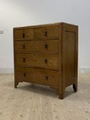 A 1930's/ 1940's oak chest of drawers, fitted with two short and three long graduated drawers,