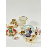 A group of Limoges ceramics including coffee can and saucer, miniature two handled tray, book,