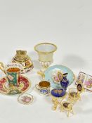 A group of Limoges ceramics including coffee can and saucer, miniature two handled tray, book,