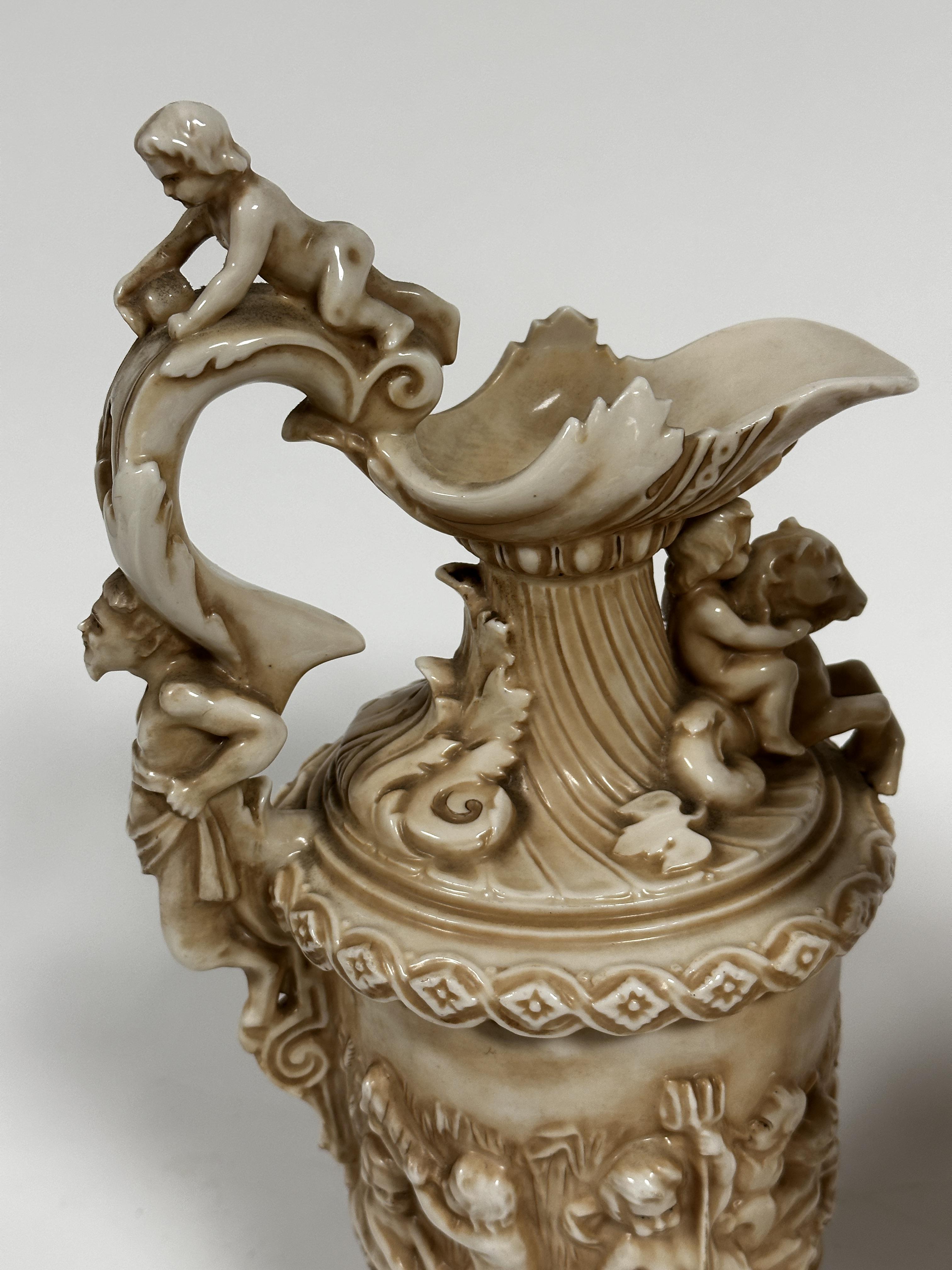 A pair of late 19thc Rudolstadt Straus & Sohne ewers, the handles mounted with cherubs with mask - Image 8 of 12