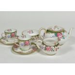 A Royal Doulton 1920s/30s seven piece morning tea set including teapot, (h 10cm d 12cm), milk jug,