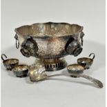 A Sheffield plated lotus form impressive punch bowl with lion mask ring handles to side, with chased