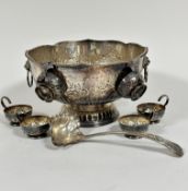 A Sheffield plated lotus form impressive punch bowl with lion mask ring handles to side, with chased