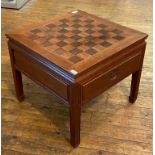 A Chinese style hardwood games table, the top inset with chess board, with through frieze drawer,