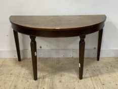 A Georgian mahogany demilune table, raised on square tapered supports, (formerly one end of a 'D'