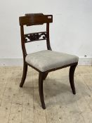 A Regency inlaid mahogany side chair, the gadrooned crest rail over floral rail back, upholstered