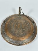 A 19thc Eastern, possibly Syrian, copper circular water container with brass spout to top, centre