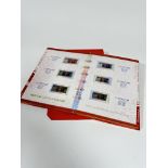 A Chinese presentation album containing a collection of People's Bank of China Hundred Yen, Fifty