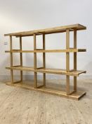 A contemporary satin birch three tier open shelf, H122cm, W185cm, D38cm