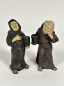 A pair of Continental Bu Pottery Merry Monk figure candle holders dressed in traditional robes (h 20