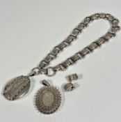 A Victorian circular and oval engraved link necklace with two circular snap open and closed