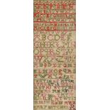 A 19thc sewn work alphabet sampler on linen using coloured wools, by Mary Mitchel in oak glazed