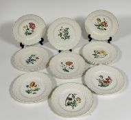 A set of twelve Copeland Spode dinner plates, each decorated with a different flower (marked