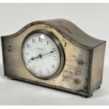 A Wilson Sharp of Edinburgh Epns arched mantel clock with enamelled dial and roman numerals, with