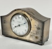 A Wilson Sharp of Edinburgh Epns arched mantel clock with enamelled dial and roman numerals, with