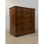 A Victorian mahogany chest fitted with two short and three long graduated drawers, with drawer to