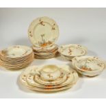 An Alfred Meakin Marigold, part dinner service comprising five side plates,two serving dishes, two