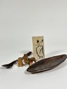 A Haida British Columbian pottery oval shaped dish with sea monster design (2.5cm x 28cm x 11cm) and