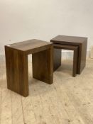 A contemporary mango wood lamp table (H58cm) together with a pair of walnut veneered nesting tables,
