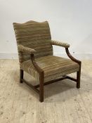 A 20th century mahogany framed Gainsborough type chair, the wide and deep seat and back