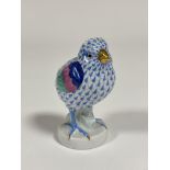 A Herend porcelain model of a Chick in a blue pattern with gilt claws and beak. ( h including base -