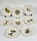 A set of eight Alferd Meakin, dinner plates decorated " Bird of America", such as the king bird,